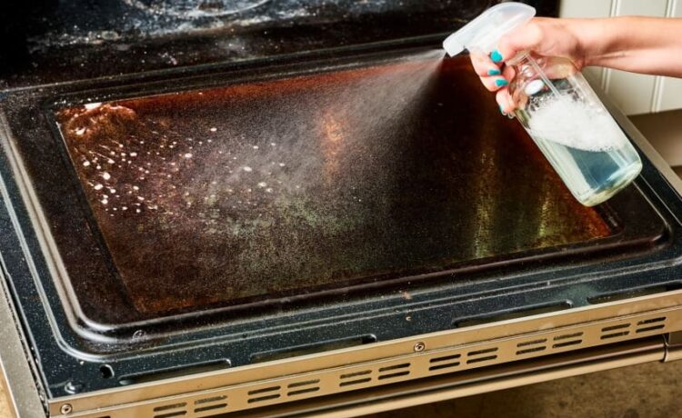 How do we clean the glass on your oven door?